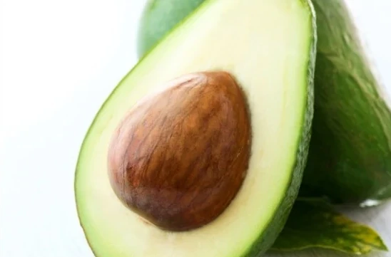 Fresh avocado cut in half